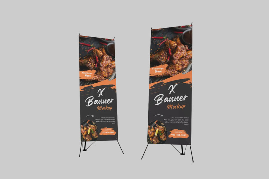 Two X-frame banners of different heights with a sample food design on black stands against a grey background