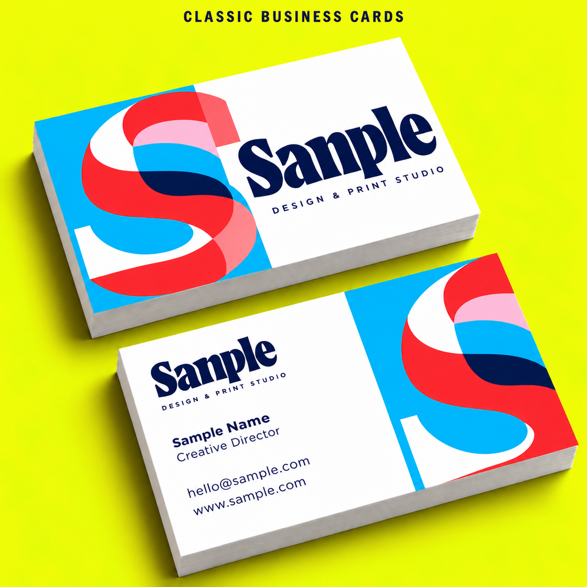 Classic business cards with colourful sample artwork on a neon yellow background